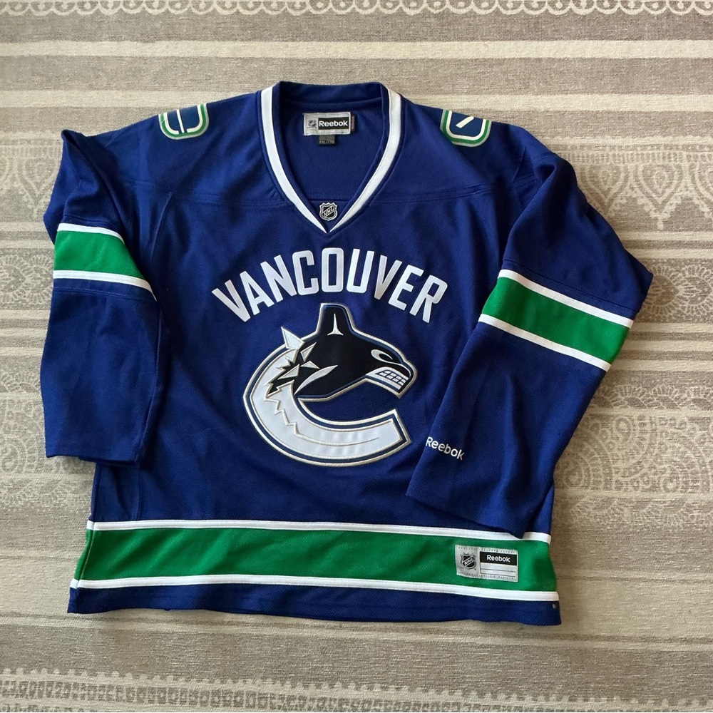 Women’s Reebok Vancouver Canucks Blue and White NHL Jersey